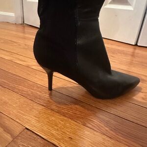Leather black boots in great condition! Half leather and half material.